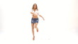 sexy young girl dancing against white background