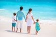 Photo: Family on a tropical beach vacation Family on a tropical beach vacation
