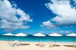 Chairs and umbrellas on tropical beach
