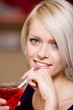 Photo: Beautiful woman sipping a martini Beautiful woman sipping a martini