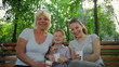 family smiling at the camera