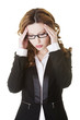 Businesswoman with a headache holding head