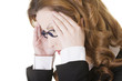 Businesswoman with a headache holding head