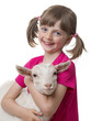 happy little girl with little goat isolated on white background