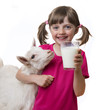 little girl drinking healthy goat milk