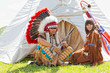 Group of North American Indians about a wigwam