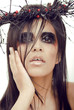 pretty woman with make up like demon