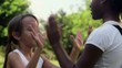 Video: Young girls playing, two happy female friends in city park Young girls playing, two happy female friends in city park