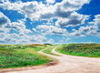 dirt road and clouds
