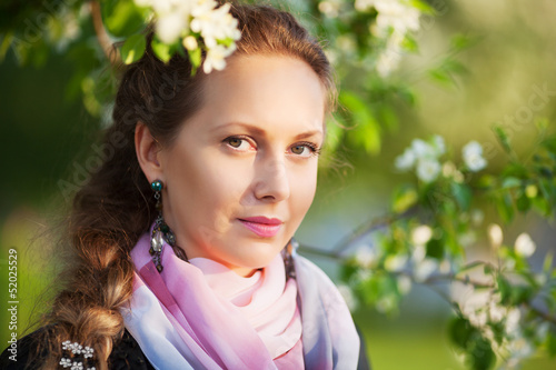 Photo: Beautiful woman in a spring garden Beautiful woman in a spring garden