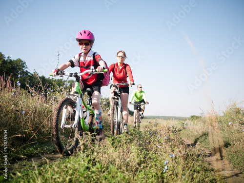 Photo: family cycling outdoors family cycling outdoors