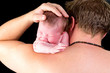 Father with newborn baby
