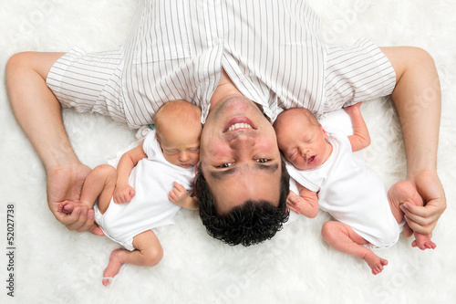 Photo: Daddy with twins Daddy with twins
