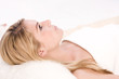 Woman lying on a comfortable spa bed