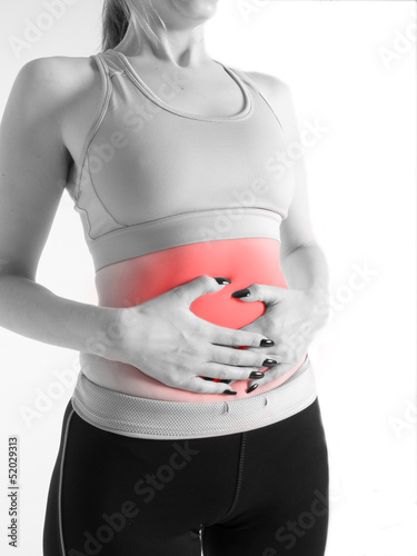 Photo: woman with stomach pain woman with stomach pain