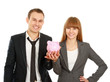 A businesswoman and man holding a piggy bank
