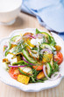 Fresh salad with roasted chicken and potatoes