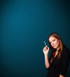 Photo: Beautiful woman smoking cigarette vith copy space Beautiful woman smoking cigarette vith copy space