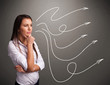 Photo: Attractive teenager looking at multiple curly arrows Attractive teenager looking at multiple curly arrows
