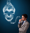 Young man smoking dangerous cigarette with toxic skull smoke