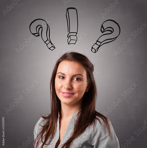 Photo: Young lady thinking with question marks overhead Young lady thinking with question marks overhead