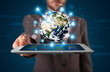 Photo: Businessman presenting 3d earth globe in tablet Businessman presenting 3d earth globe in tablet