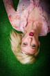 blonde on a green field