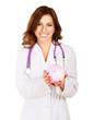 Photo: A doctor holding piggy box with a stethoscope, close-up A doctor holding piggy box with a stethoscope, close-up