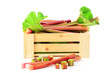 Fresh rhubarb in wooden crate