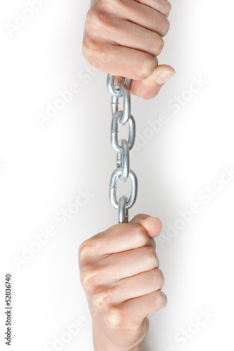 Photo: hands holding a chain. isolated on white background hands holding a chain. isolated on white background