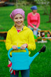 Gardening - young girl helping in the garden