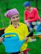 Gardening - young girl helping in the garden