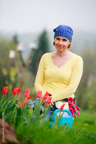 Photo: Gardening - woman working in the garden Gardening - woman working in the garden