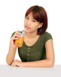 Photo: Young asian woman with a glass of orange juice Young asian woman with a glass of orange juice