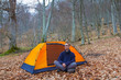tourist near a tent