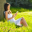 Close up portrait of young female with tablet pc.