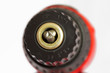 closeup red electric drill on a white background
