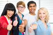 Students giving the thumbs-up sign