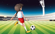 A girl playing soccer at the field