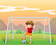A soccer player in a red shirt