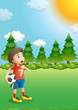 A young football player at the hill