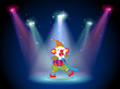 A clown at the stage with spotlights