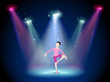 A woman performing ballet on the stage with spotlights
