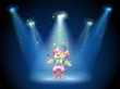 A clown juggling at the stage