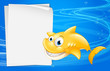 A yellow fish beside an empty paper
