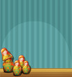 A blue wall with four Russian dolls