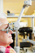 Woman gets examination at ophthalmologist