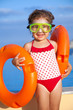 little girl goes to pool