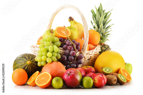 Photo: Variety of fruits in wicker basket isolated on white Variety of fruits in wicker basket isolated on white