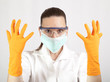 Female doctor surgeon or chemist wearing latex gloves